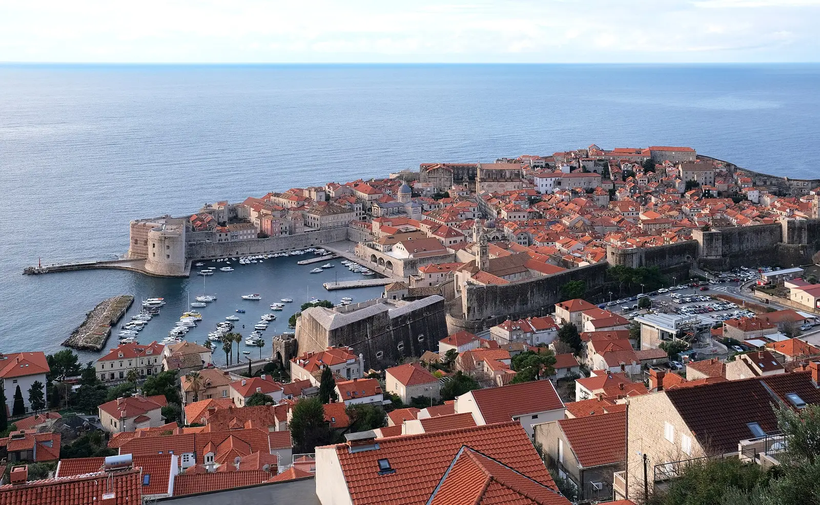 The terracotta roofs and stone walls of Dubrovnik's Old Town by the Adriatic.